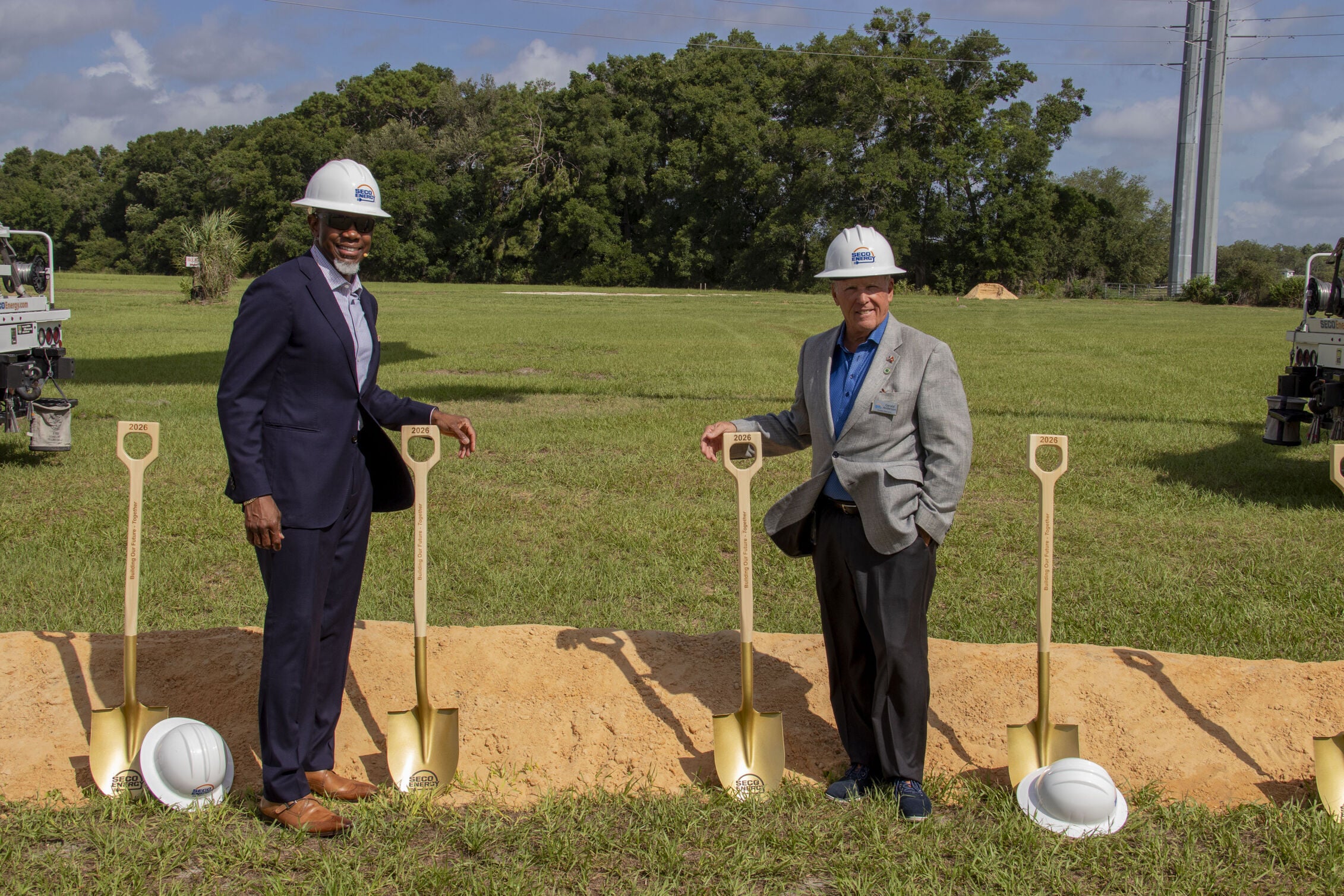 CEO & President with shovels